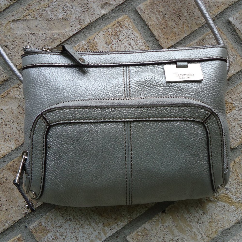 Tignanello silver pebbled leather crossbody mini bag.